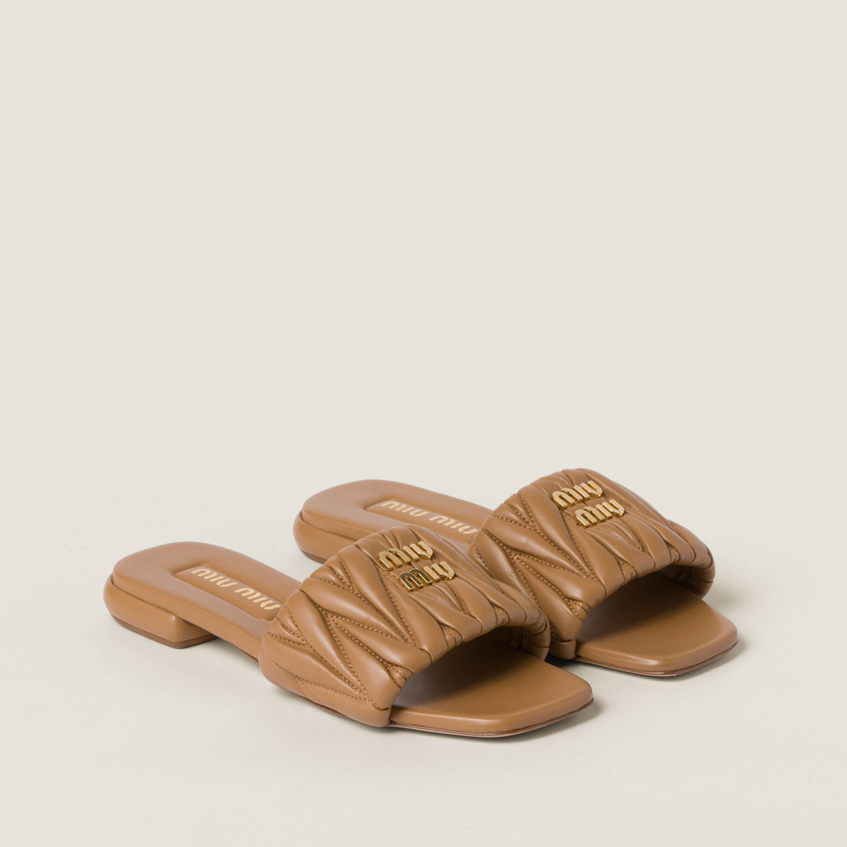 Miu Miu Matelasse Nappa Leather Slides Caramel MM261208 Miu Miu Matelasse Nappa Leather Slides Caramel MM261208