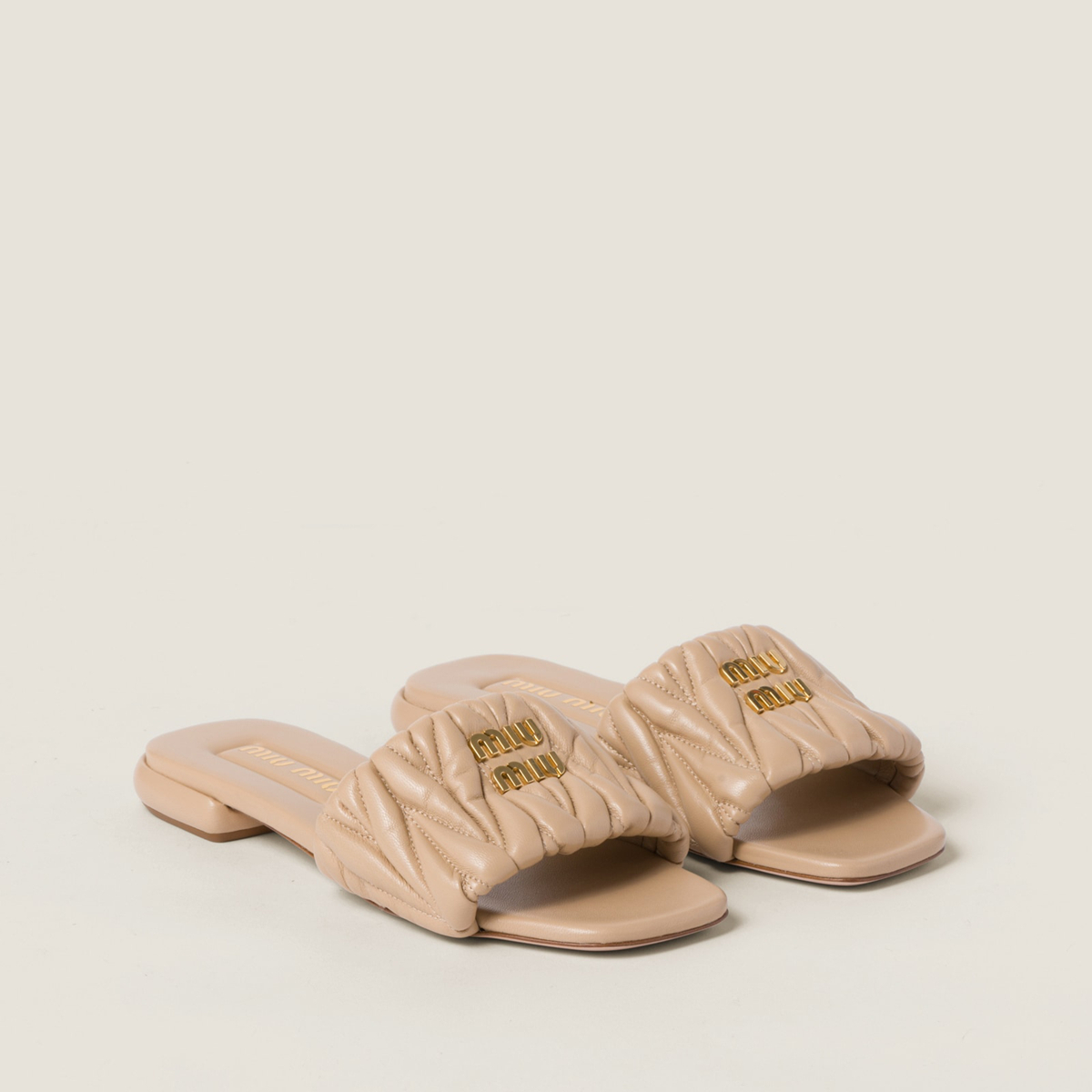 Miu Miu Matelasse Nappa Leather Slides Sand Beige MM261210 Miu Miu Matelasse Nappa Leather Slides Sand Beige MM261210