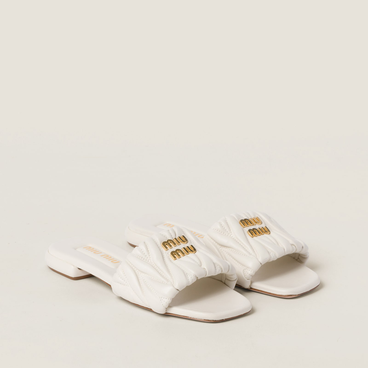 Miu Miu Matelasse Nappa Leather Slides White MM261211 Miu Miu Matelasse Nappa Leather Slides White MM261211
