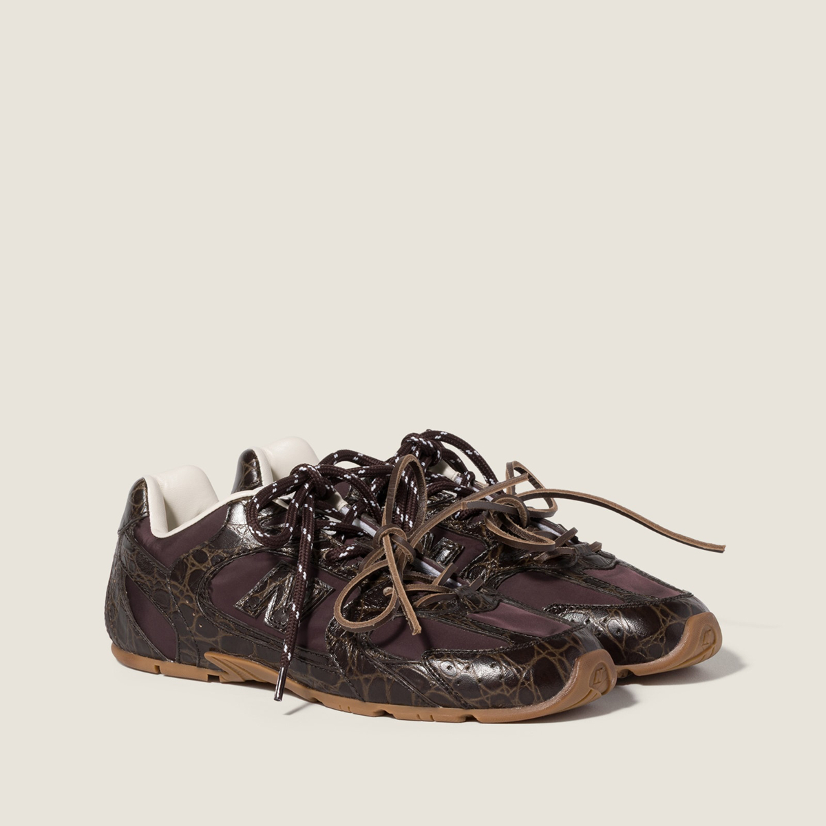 New Balance X Miu Miu 530 Sl Crocodile Embossed Calfskin And Technical Fabric Sneakers Dark Brown MM261335 New Balance X Miu Miu 530 Sl Crocodile Embossed Calfskin And Technical Fabric Sneakers Dark Brown MM261335