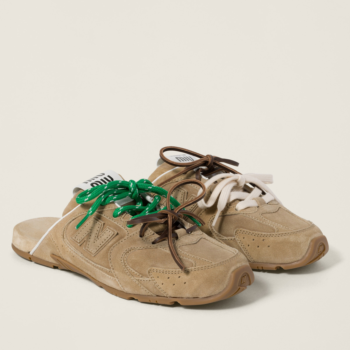 New Balance X Miu Miu 530 Sl Faded Suede Mules Ecru MM261129 New Balance X Miu Miu 530 Sl Faded Suede Mules Ecru MM261129